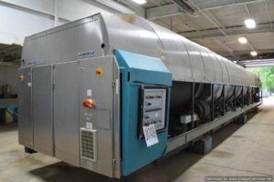 a linen folding machine in an industrial laundry facility 